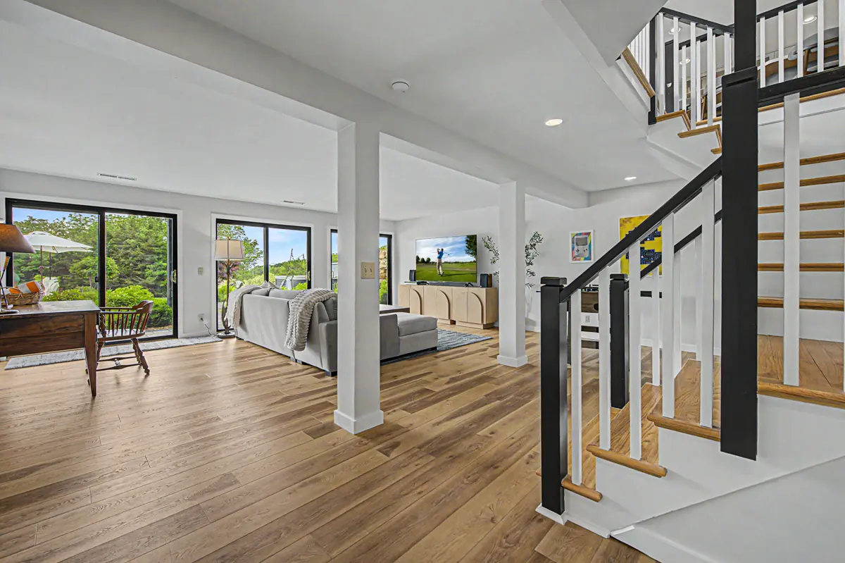 Lower-level family room with walk-out windows