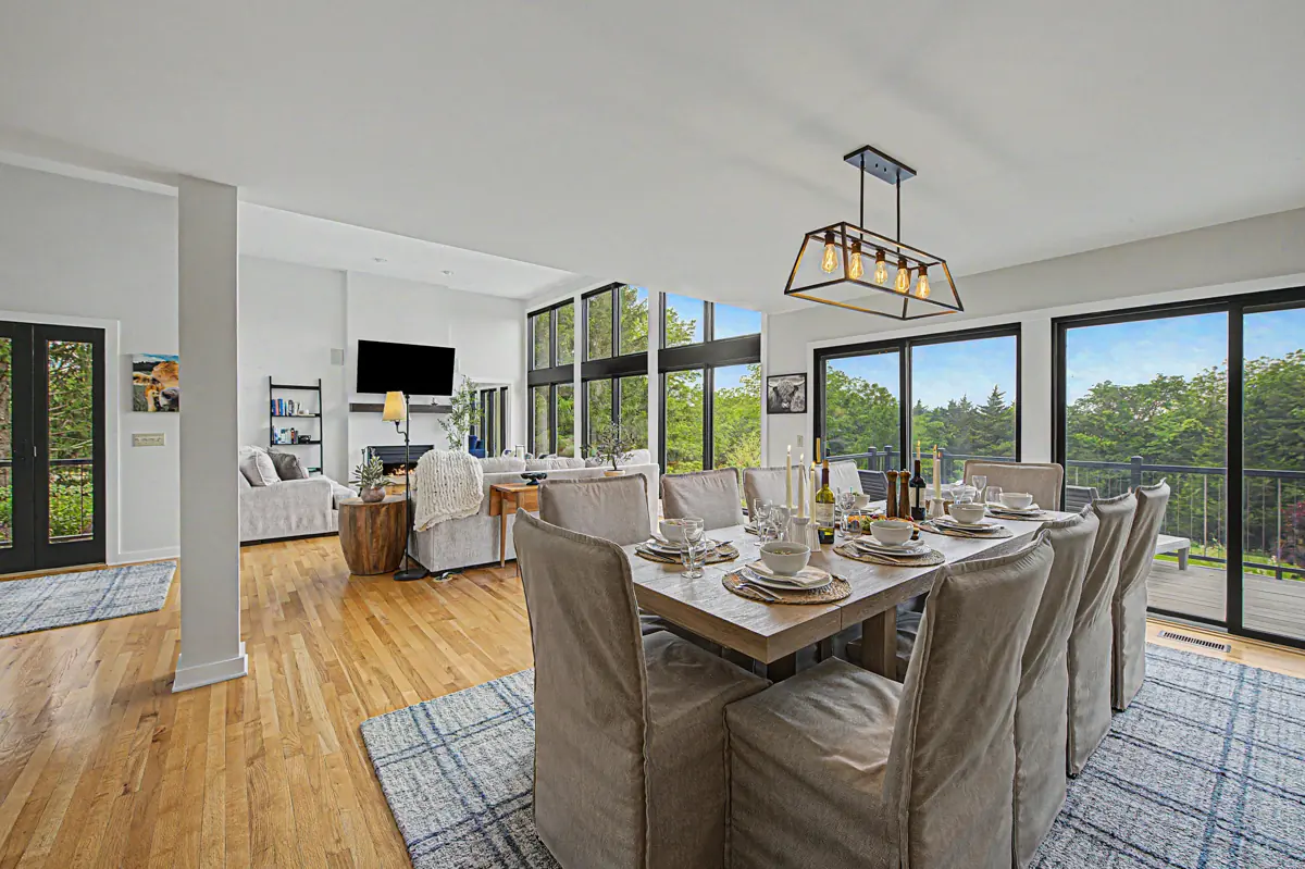 Dining and living area with long table