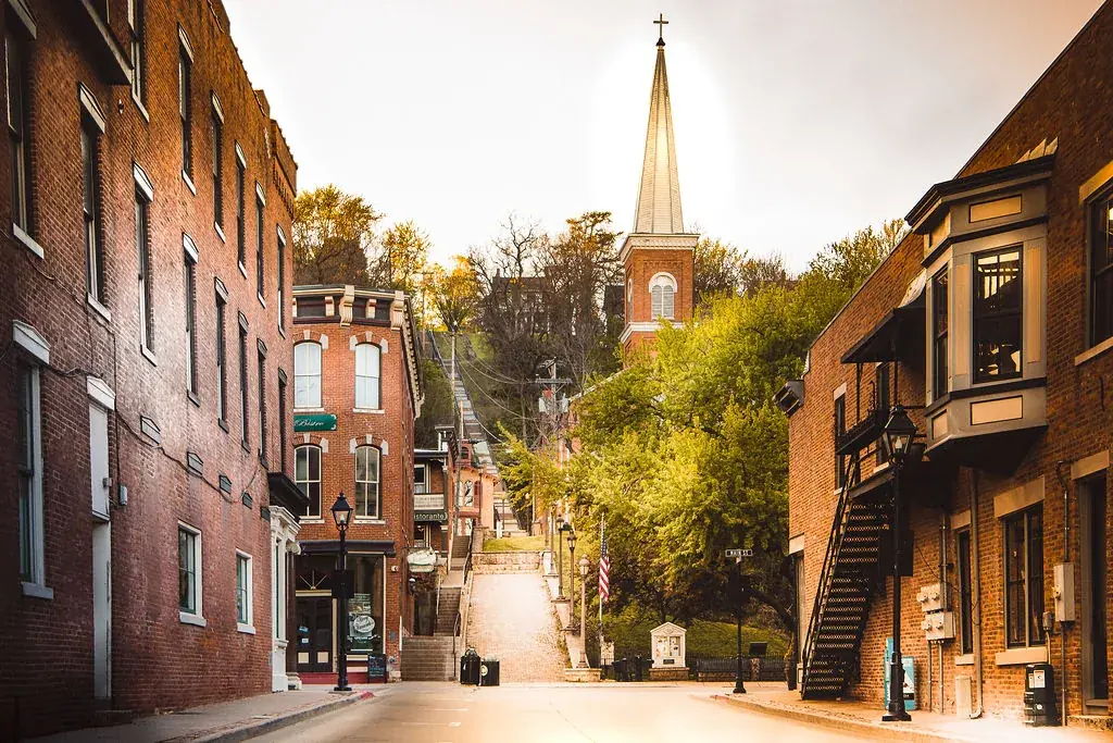 A Galena street climbing toward a church steeple