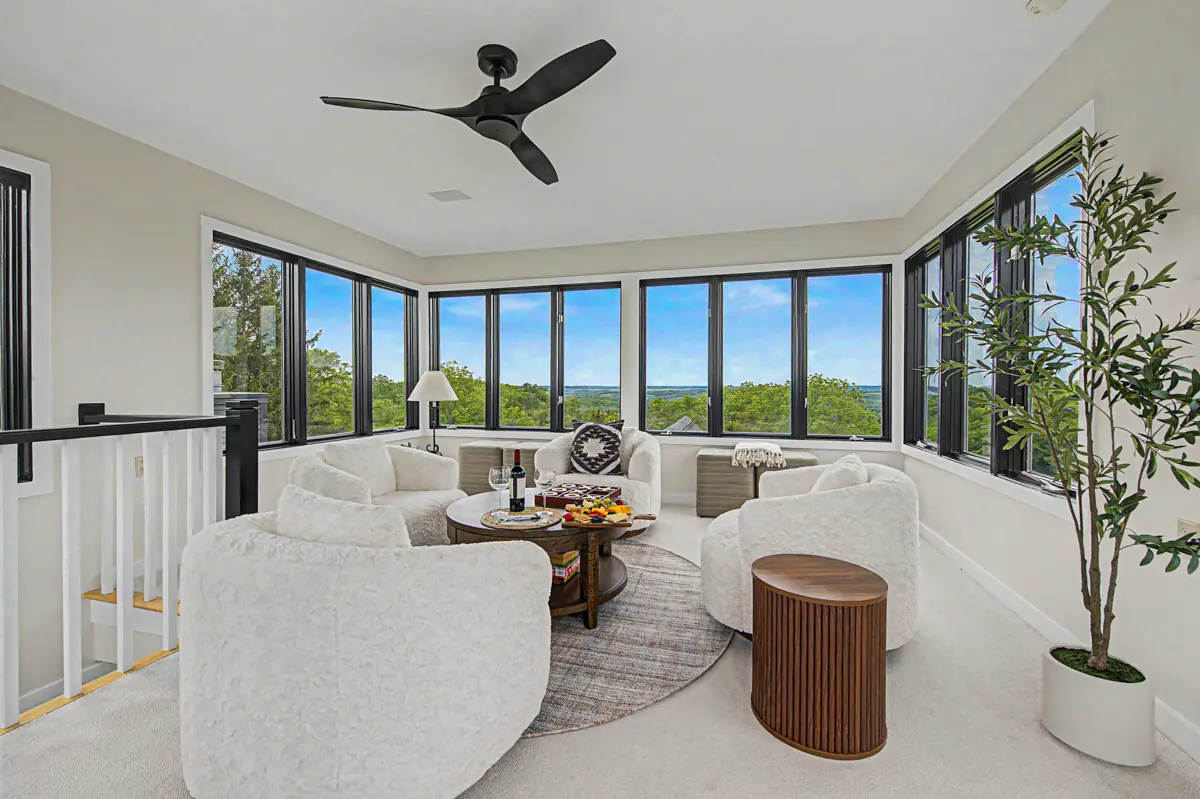 Tower room lounge with treetop views in every direction